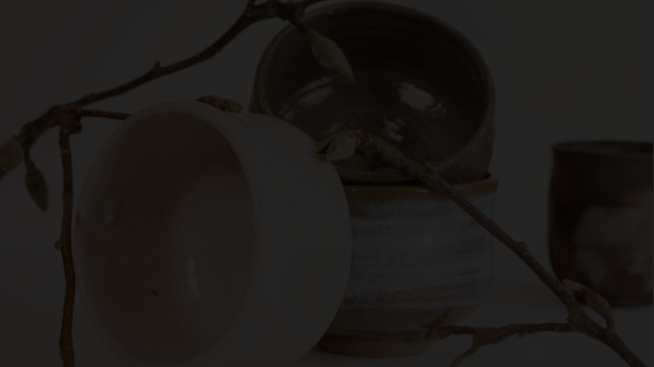 A collection of Japanese tea bowls, showcasing their unique designs and craftsmanship